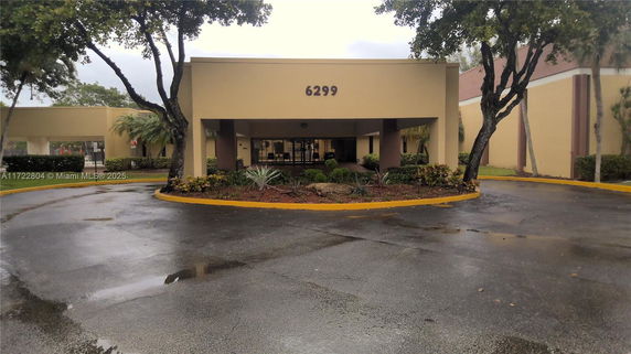 Front view of a building with the number 6299 displayed above the entrance.