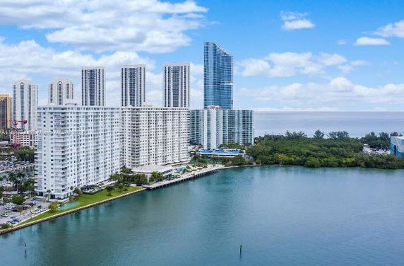 High-rise buildings overlooking a body of water.