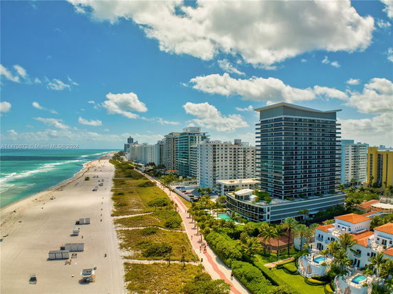 Coastal view with high-rise buildings along the beach.