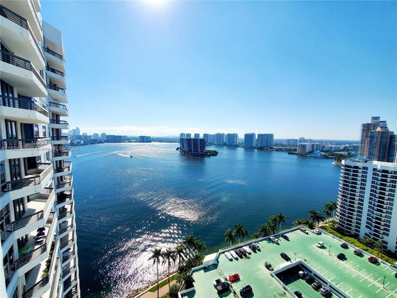 Wide angle view of city skyline and waterfront from a high-rise building.