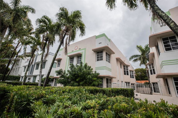 Front view of a multi-story residential building with Art Deco design elements.
