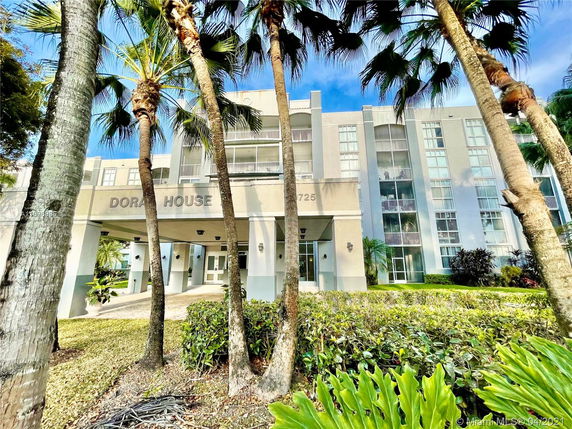 Front view of a multi-story building named Doral House.