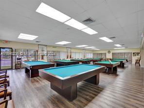 Room with multiple billiard tables