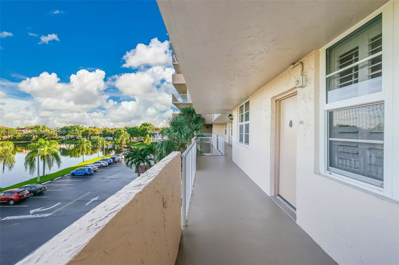 View of the surrounding areas from an apartment building corridor.