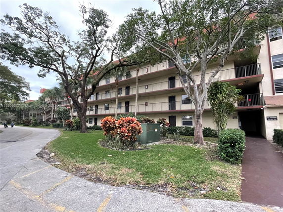 Front view of a multi-story residential building.