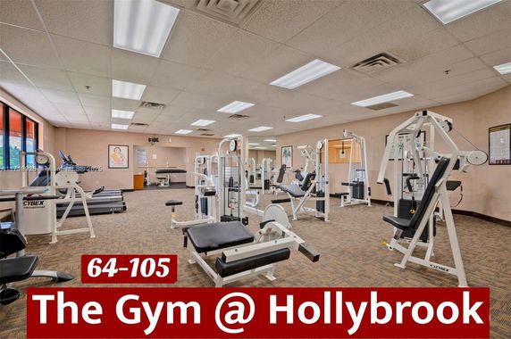 Indoor view of a gym with various weight machines and exercise equipment.