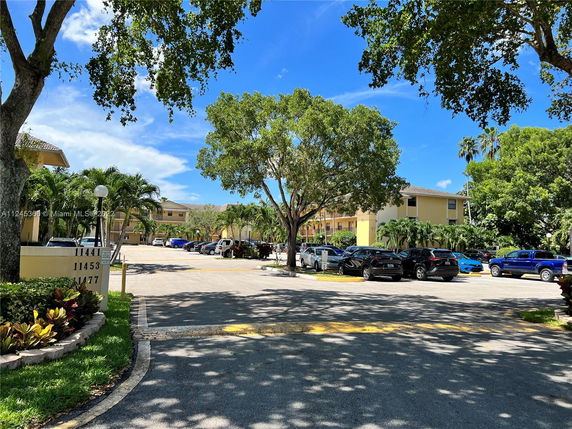 Outdoor parking area in front of residential buildings