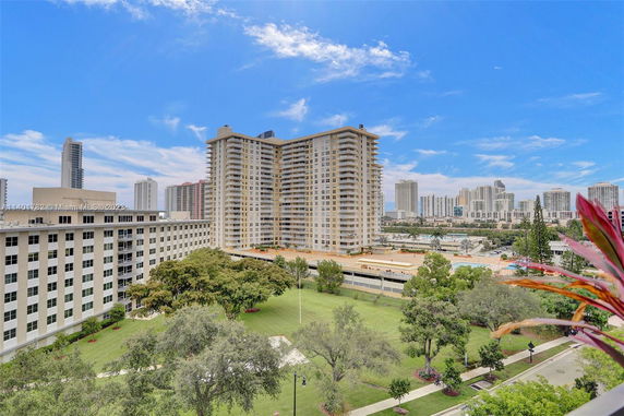Distant view of tall residential buildings in a cityscape area.