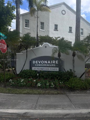 Front view of DevonAire Condominiums building.
