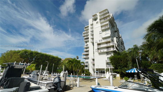 View of a multi-story building with balconies.