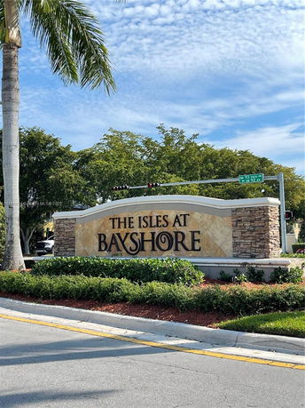 Entrance sign for 'The Isles at Bayshore' community.