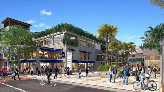 Front view of a modern multi-story building with large windows and blue awnings in a busy urban area.