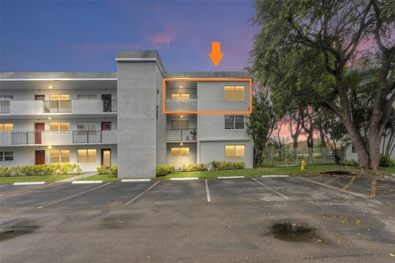 Front view of a multi-story apartment building.