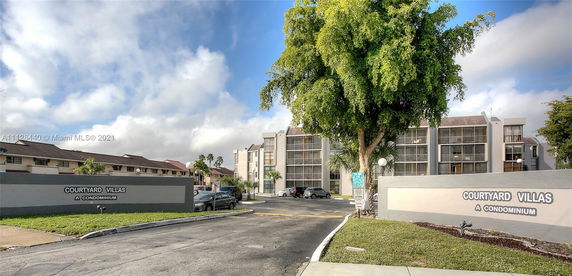 Front view of a condominium complex named Courtyard Villas.