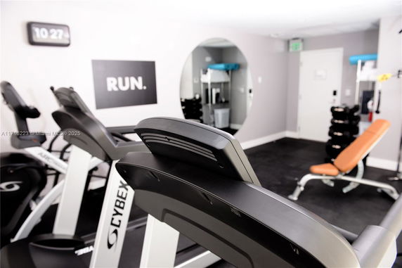Interior of a home gym with treadmills and exercise equipment.