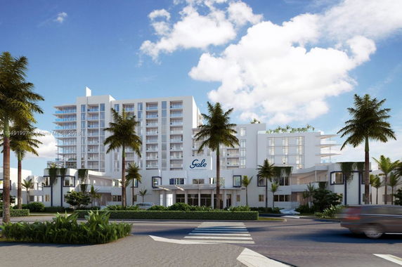 Front view of a multi-story hotel with a modern design and balconies.