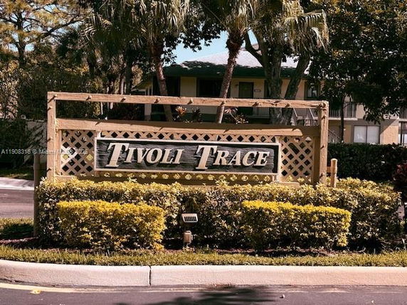 Front view of a building with a Tivoli Trace sign.