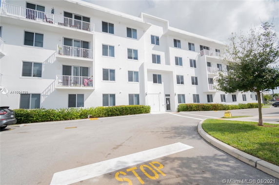 Front view of a multi-story apartment building.