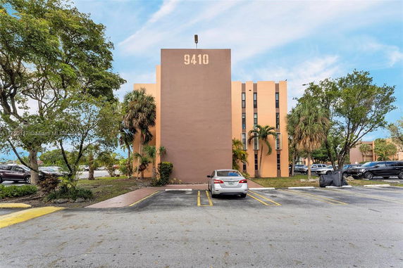Front view of a multi-story building with a flat facade and labeled number 9410.