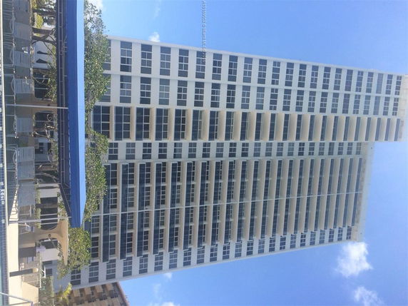 Front view of a multi-story residential building.