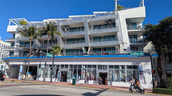 Front view of a multi-story commercial building with a modern facade.