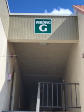 Front view of a building with a sign labeled 'Building G'.