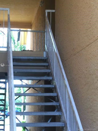 Staircase leading to an entryway of a building.