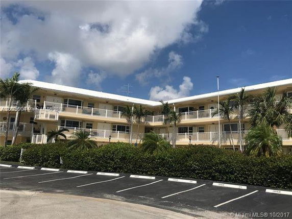 Front view of a three-story apartment building.