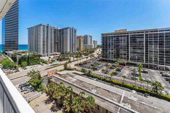 View of multiple high-rise buildings near the ocean.
