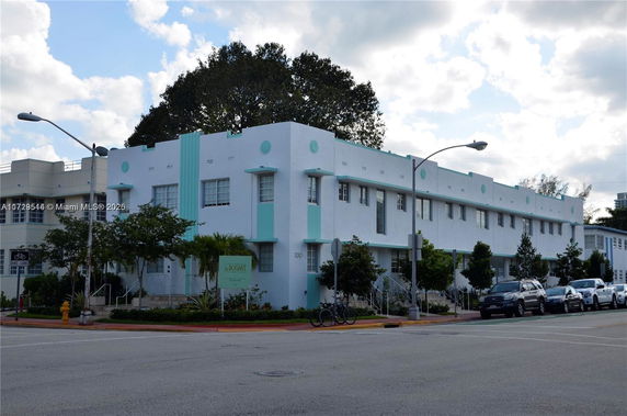 Front view of a two-story building with art deco style design.