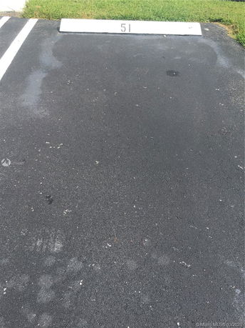 Outdoor parking space marked with the number 51.