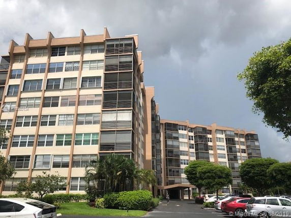 Front view of a multi-story apartment building.