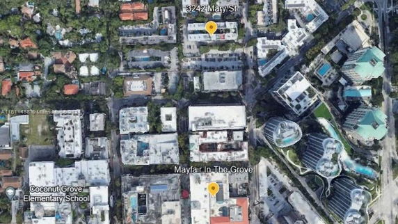Aerial view of urban buildings and streets.