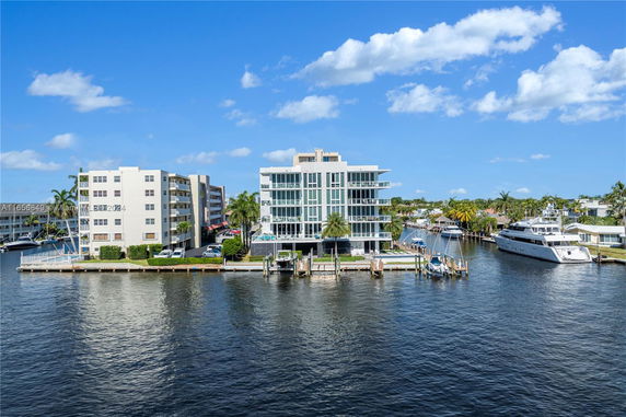 View of waterfront buildings with boat docks.