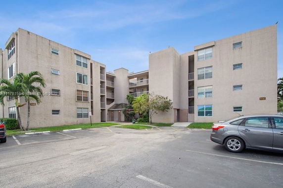 Front view of a multi-story apartment building.