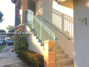 Exterior staircase leading up to a building entrance.