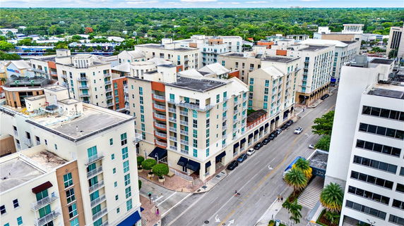 Aerial view of multi-story buildings in an urban area.