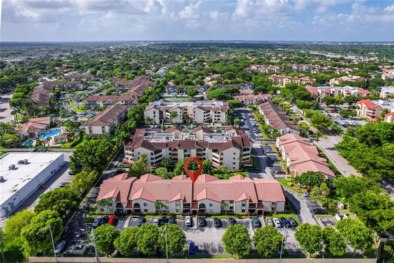 Aerial view of residential buildings in a suburban area.