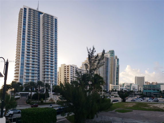 View of multiple high-rise buildings with a mixture of modern architectural designs.