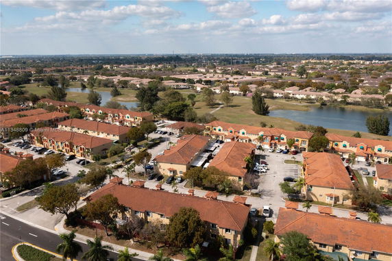 Panoramic view of a residential area with multiple apartment buildings and surrounding landscape.