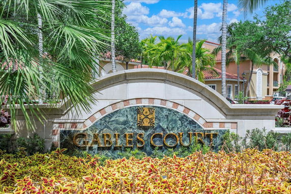 Front view of a residential building with a decorative sign 'Gables Court'.