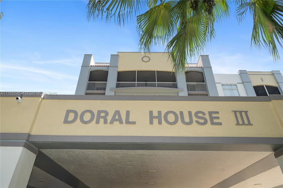 Front view of a multi-story building with 'Doral House III' signage.