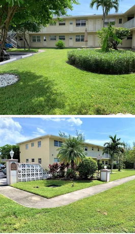 Front view of a two-story apartment building with exterior walkways and a landscaped lawn.