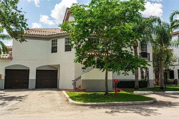 Front view of a two-story house with a double garage.