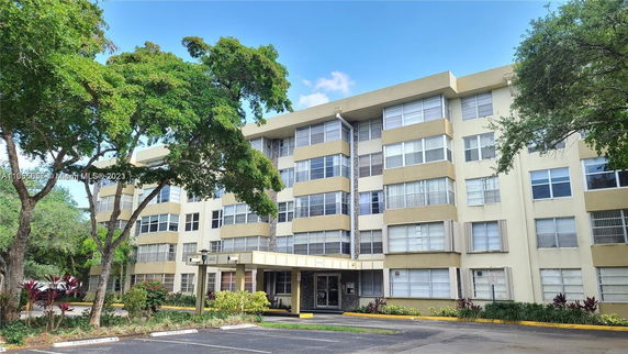 Front view of a multi-story apartment building.