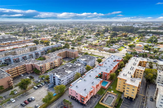 Aerial view of multiple residential buildings in an urban area.