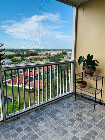 View of surrounding residential area from a balcony.