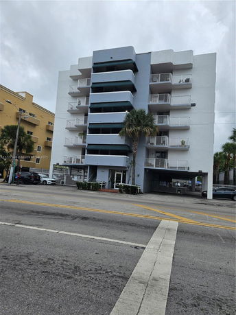 Front view of a multi-story apartment building.