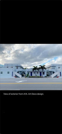 Front view of an Art Deco building with prominent architectural features.