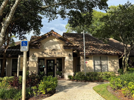 Front view of a building with a decorative entrance.